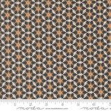 a repeating pattern of orange and white flowers on a dark background.