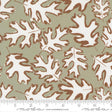 a repeating pattern of white and brown leaves on a green background.