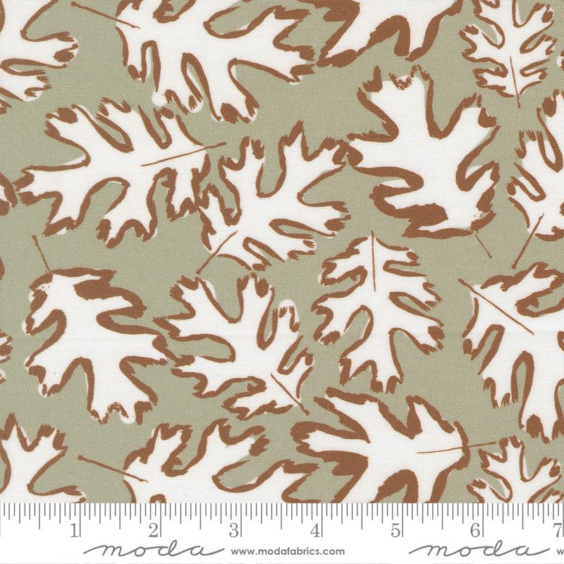 a repeating pattern of white and brown leaves on a green background.