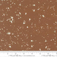 The image is a brown fabric with white speckles or dots scattered across it.