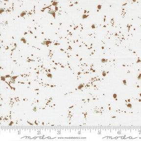 The image is a fabric with a white background and brown splatter-like patterns.