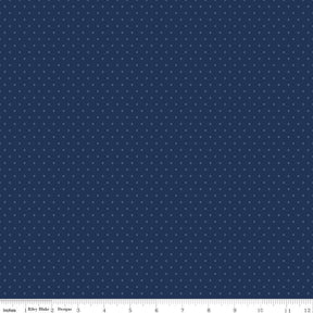 The image is a dark blue fabric with small white dots covering the entire surface.