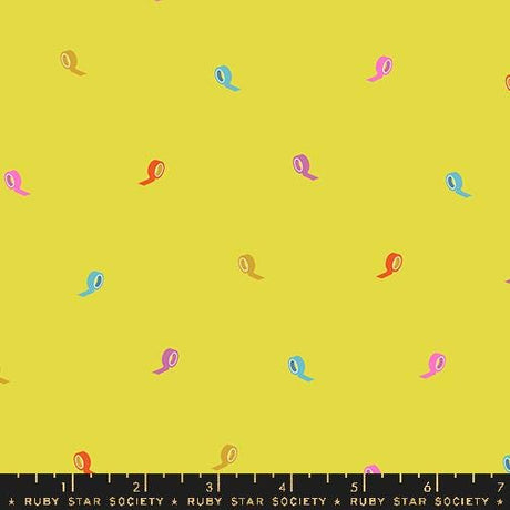 a repeating pattern of colorful tape rolls on a yellow background.