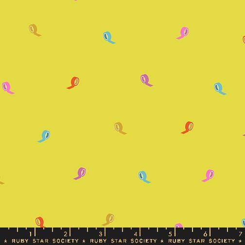 a repeating pattern of colorful tape rolls on a yellow background.