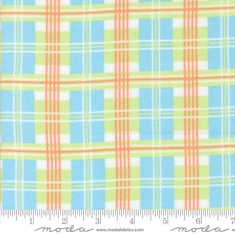 The image is a fabric with a plaid pattern in shades of blue, green, and orange. The fabric appears to be a soft, textured material suitable for clothing or home decor.