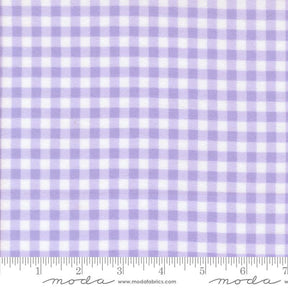 a fabric with a purple and white gingham pattern, which is a type of checkered fabric. The fabric appears to be a fabric with a purple and white checkered pattern, and it is described as a fabric with a purple and white checkered pattern.