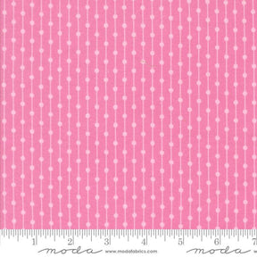 The image is a close-up of a fabric with a pink and white striped pattern.