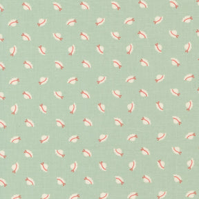 a repeating pattern of small white and red hats on a light green background.