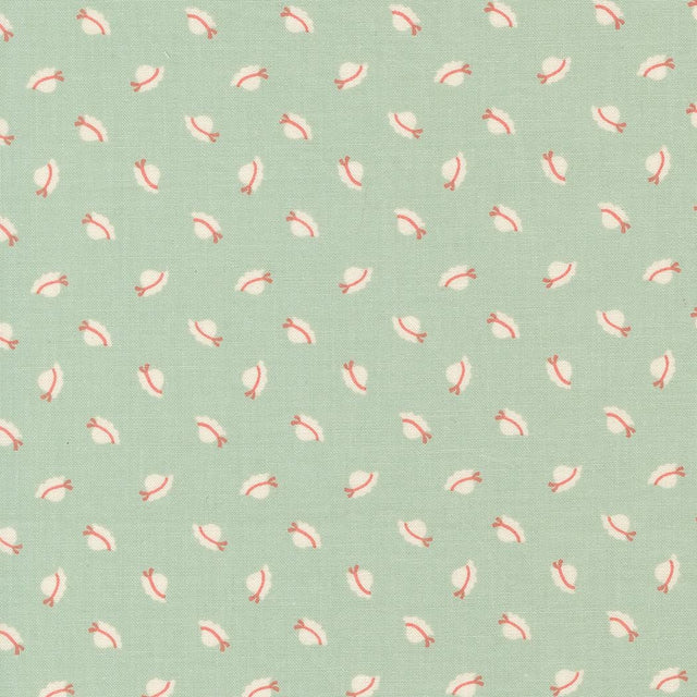 a repeating pattern of small white and red hats on a light green background.