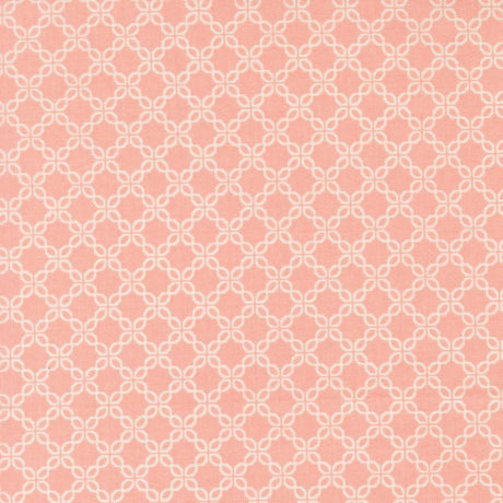 a repeating pattern of white flowers on a pink background.