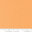 The image is a fabric with a repeating pattern of small white dots or stars on an orange background.