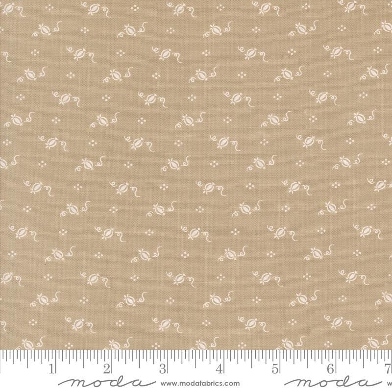 The image is a fabric with a repeating pattern of small white flowers or leaves. The pattern is evenly spaced and covers the entire fabric surface.