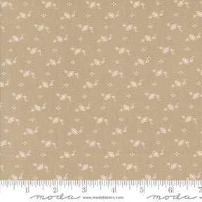 The image is a fabric with a repeating pattern of small white flowers or leaves. The pattern is evenly spaced and covers the entire fabric surface.