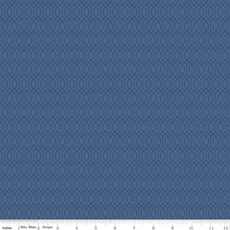 The image is a blue fabric with a repeating pattern of hexagons.