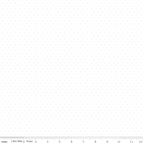 The image is a plain white background with a grid of small white dots, and there is a ruler at the bottom indicating the size of the image.