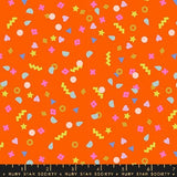 The image is a vibrant and playful collage of various colorful shapes and patterns, including stars, hearts, and geometric designs, all set against a bright orange background.