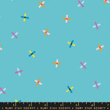 a pattern of colorful crosses on a blue background.
