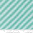 a fabric with a diagonal striped pattern in shades of green and white. The fabric appears to be a textile or material with a repeating diagonal pattern.