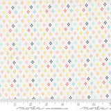 The image is a fabric with a repeating pattern of small dots in various colors, including shades of white, blue, green, yellow, and orange. The pattern is arranged in a grid-like fashion, creating a visually appealing and vibrant design.