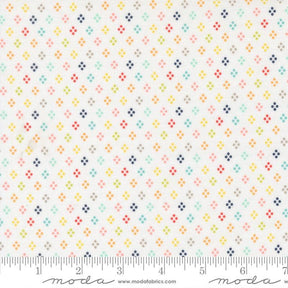 The image is a fabric with a repeating pattern of small dots in various colors, including shades of white, blue, green, yellow, and orange. The pattern is arranged in a grid-like fashion, creating a visually appealing and vibrant design.
