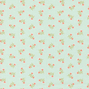 a repeating pattern of small pink flowers on a light green background.