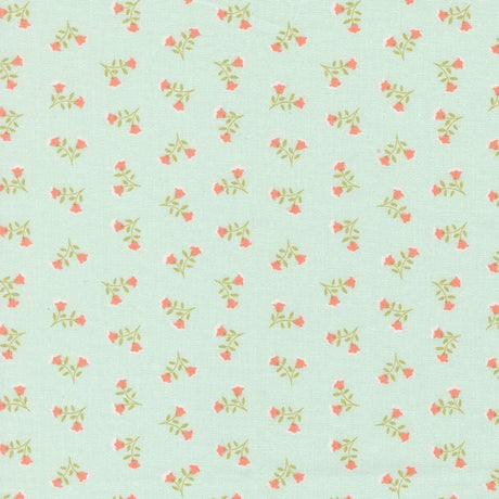 a repeating pattern of small pink flowers on a light green background.