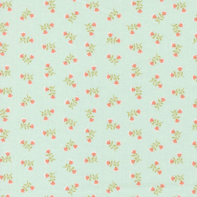 a repeating pattern of small pink flowers on a light green background.