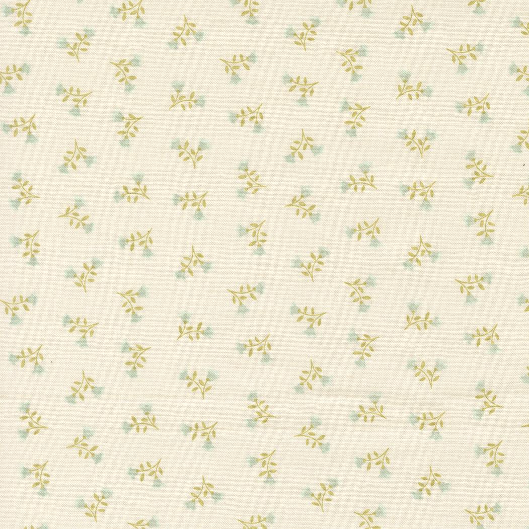 a repeating pattern of small green flowers on a light beige background.