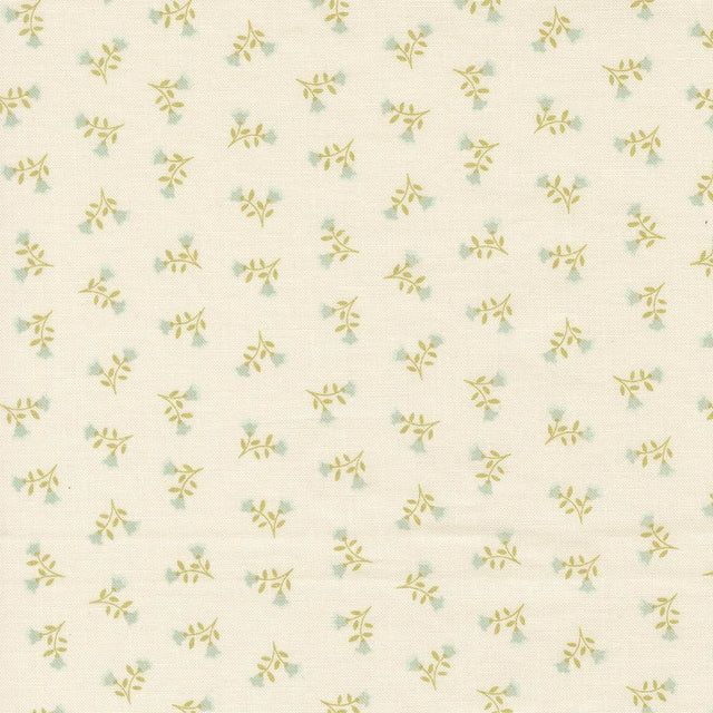 a repeating pattern of small green flowers on a light beige background.