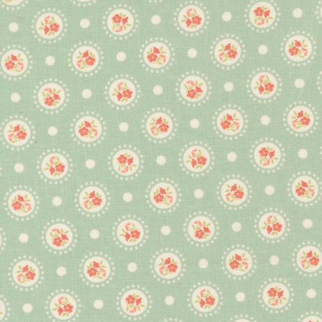 a repeating pattern of circular floral designs on a light green background, with white polka dots scattered throughout.