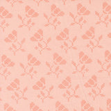 a repeating pattern of pink flowers with leaves, creating a visually appealing and harmonious design.