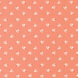 a repeating pattern of white hats with red bows on a peach-colored background.