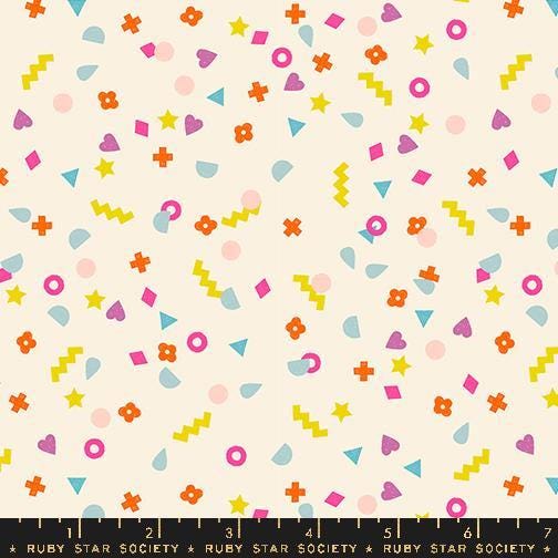 The image is a vibrant and playful collage of various colorful shapes and patterns, including stars, hearts, and geometric designs, scattered across a light background.