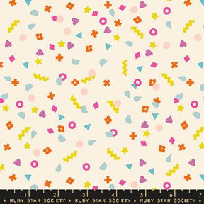 The image is a vibrant and playful collage of various colorful shapes and patterns, including stars, hearts, and geometric designs, scattered across a light background.