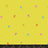 a repeating pattern of colorful tape rolls on a yellow background.