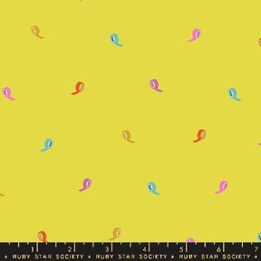 a repeating pattern of colorful tape rolls on a yellow background.