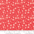 The image is a close-up of a fabric with a repeating pattern of pink flowers and leaves on a red background.