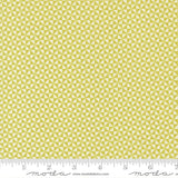 a repeating pattern of yellow triangles on a fabric surface.