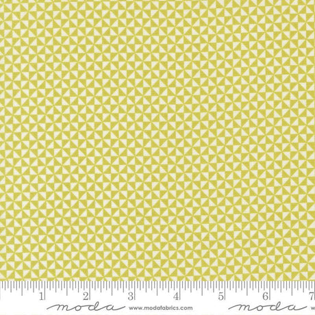 a repeating pattern of yellow triangles on a fabric surface.