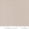 a repeating pattern of brown and white houndstooth designs, creating a visually appealing and intricate pattern.