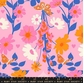 The image is a vibrant and colorful floral pattern featuring various flowers and butterflies in shades of pink, orange, and blue.
