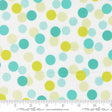 a white fabric with a pattern of multicolored polka dots in various shades of green, yellow, and blue. The fabric appears to be a textile or material with a playful and vibrant design.