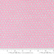 a close-up view of a fabric with a pink floral pattern. The fabric appears to be made of Moda cotton material, as indicated by the text in the image.