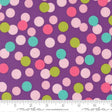The image is a fabric with a pattern of multicolored polka dots in shades of purple, pink, green, and white. The pattern is spread across the fabric, creating a visually appealing and vibrant design.