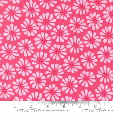 a repeating pattern of pink flowers on a red background.