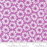 a repeating pattern of white flowers on a purple background.