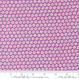 a fabric with a repeating pattern of white flowers on a purple background. The fabric appears to be a fabric with a floral pattern, and the image is described as a fabric with a floral pattern.