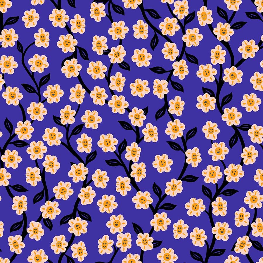 a repeating pattern of small white flowers with orange centers against a deep blue background.