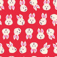 a repeating pattern of white rabbit faces on a red background.