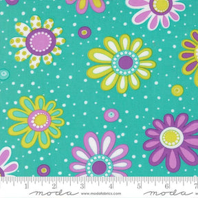 a vibrant and colorful floral pattern with various types of flowers in shades of pink, yellow, and purple against a turquoise background with white polka dots.
